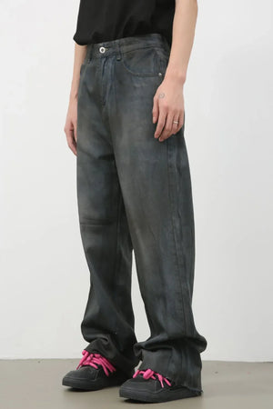 Washed denim wide-leg trousers in dark, featuring a relaxed fit and casual styling.