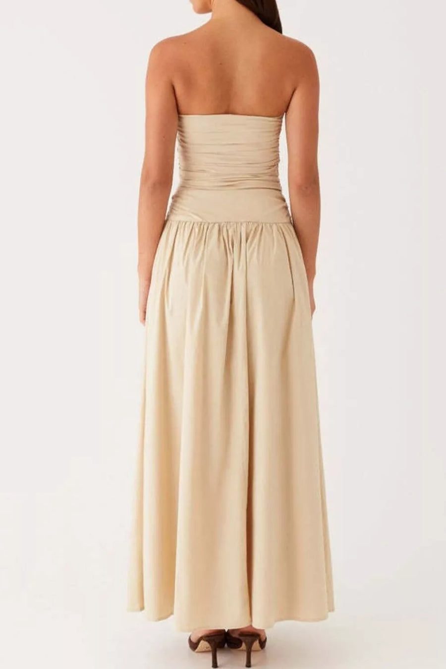 Ruched strapless maxi dress in cream with a flowing skirt and gathered waist