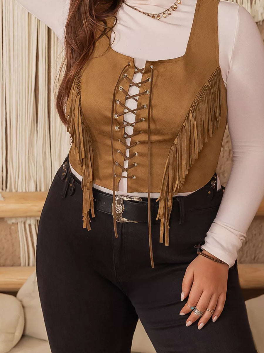 Caramel faux suede vest with fringe and lace-up front detail.