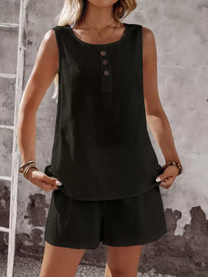Black cotton two-piece set with decorative buttons on the sleeveless top and matching shorts.