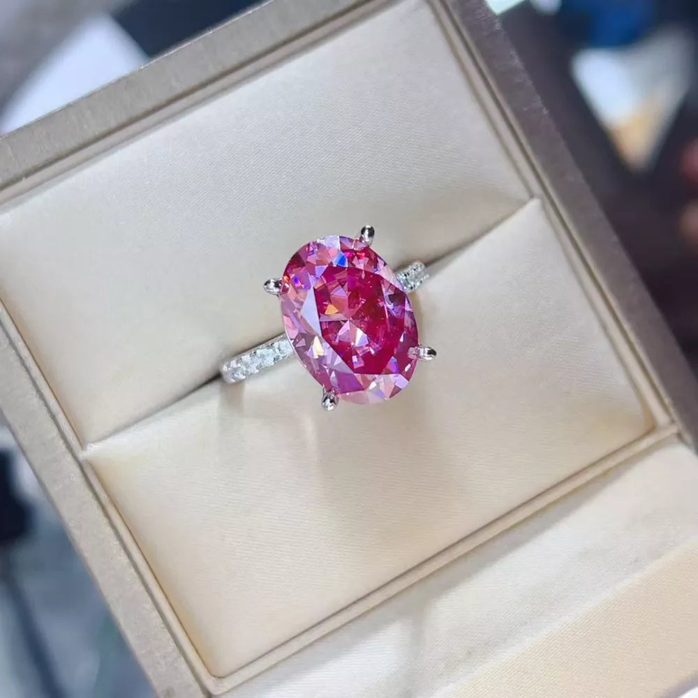 ring in fuchsia featuring oval cut gemstone and ring fit