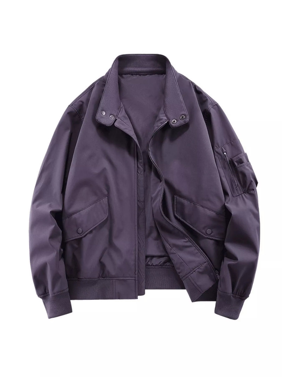 Plus-size bomber jacket in Dark Purple with zip front, snap pockets, and zippered sleeve pocket.