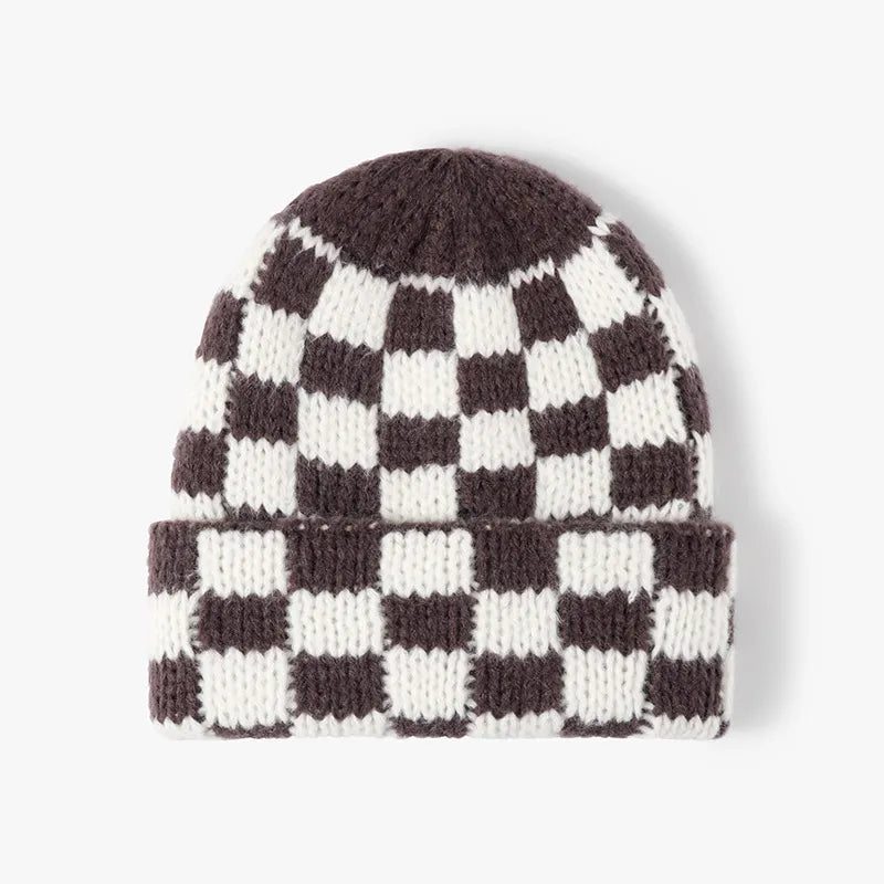 Checkerboard knit beanie in brown and white with a cuffed brim.