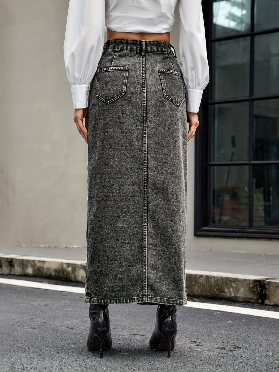 Dark gray denim maxi skirt with button front and slit, styled with a white shirt and black boots.