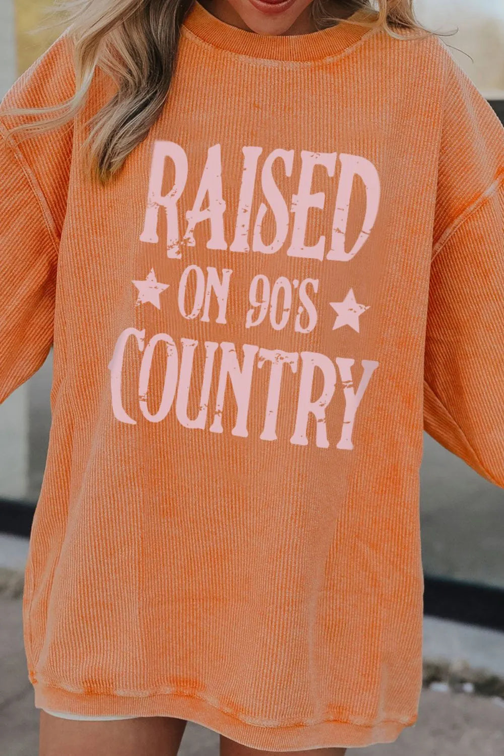 90s Country Graphic Corded Sweatshirt in Sherbet with pink text.