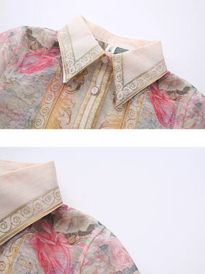 Pastel floral print button-down shirt dress with ornate collar detail.