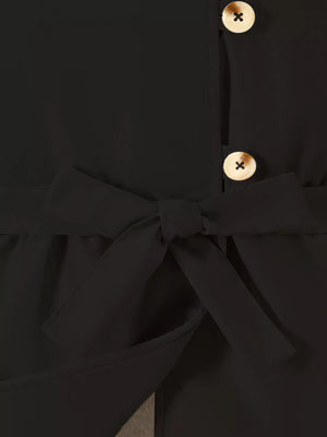 Black belted coat with bow detail and wooden buttons.