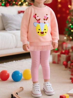 Watermelon pink kids sweatshirt with reindeer applique and ruffled hem.