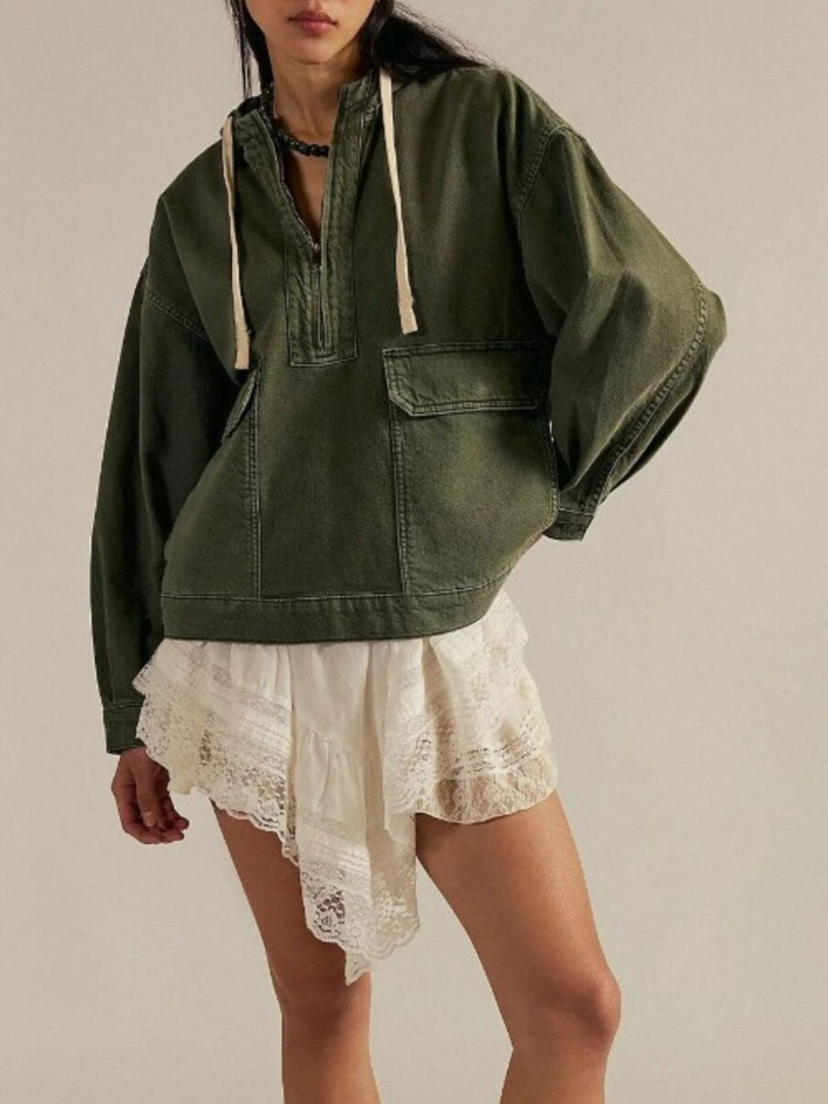 hoodie in olive green featuring drawstring and relaxed fit