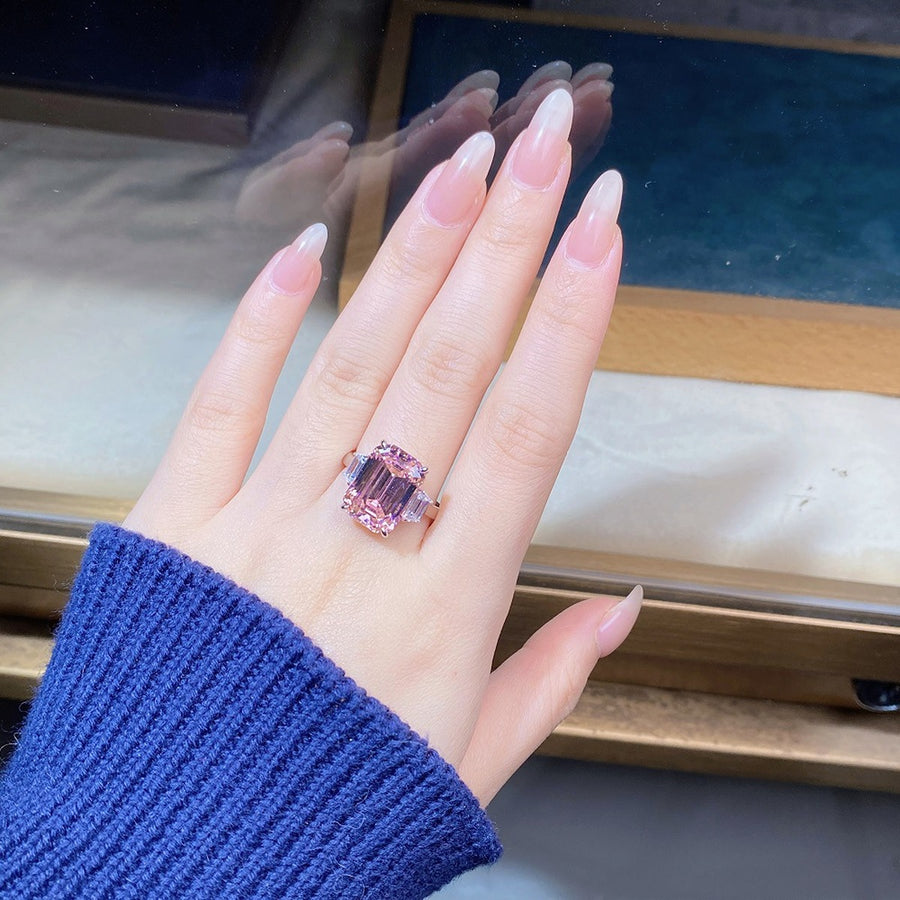 silver ring featuring geometric cut stones and geometric