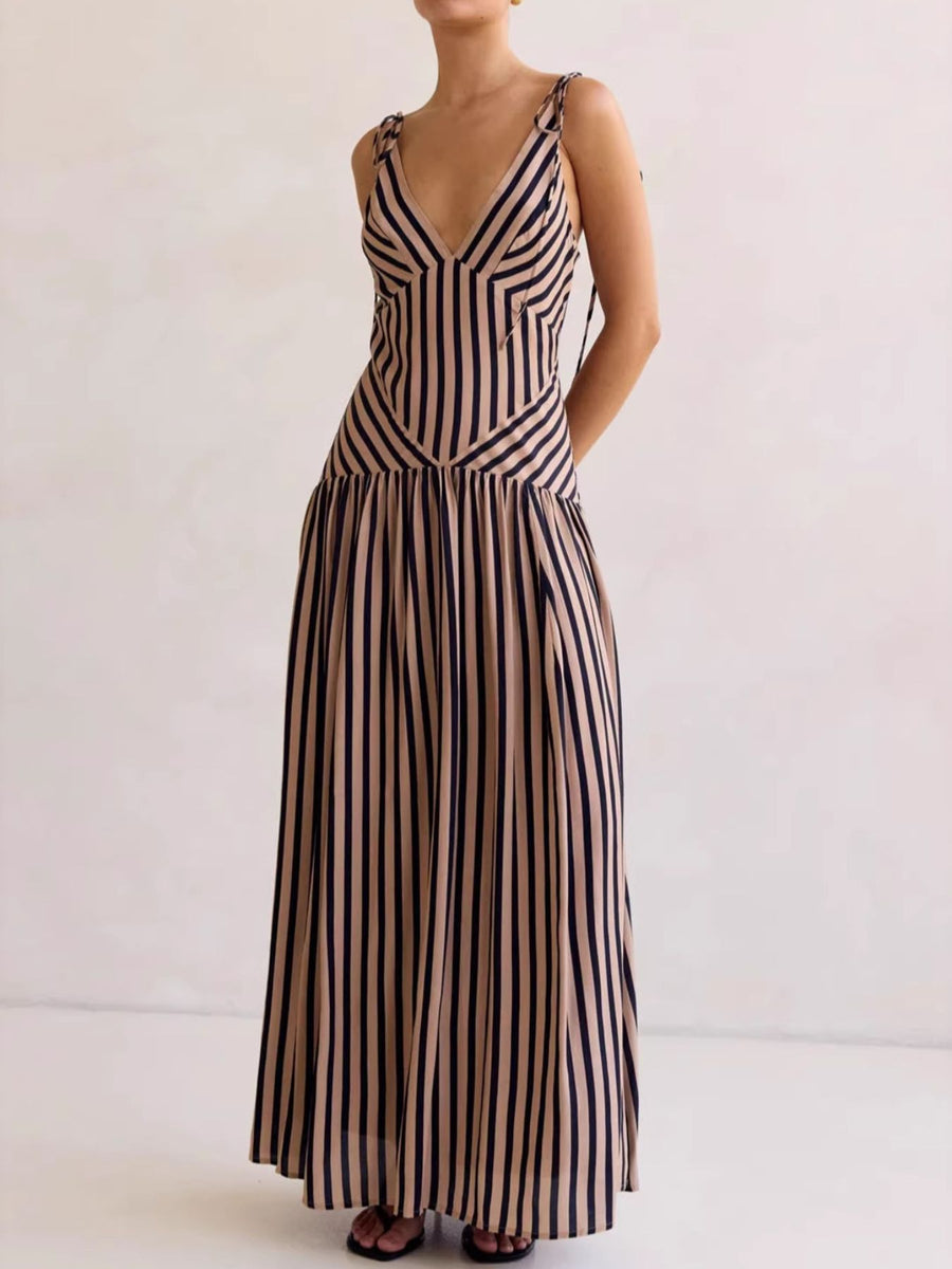 Tie-shoulder maxi dress with V-neck in brown and black vertical stripes.