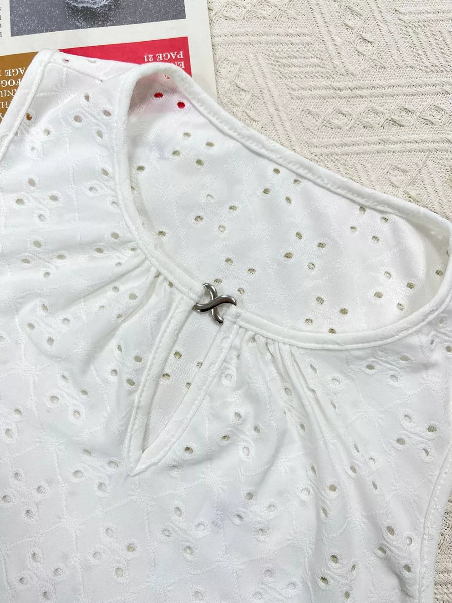 White eyelet cami tank top with keyhole detail and silver closure