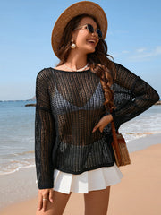 Black open-knit acrylic beach sweater with boat neck and long sleeves.