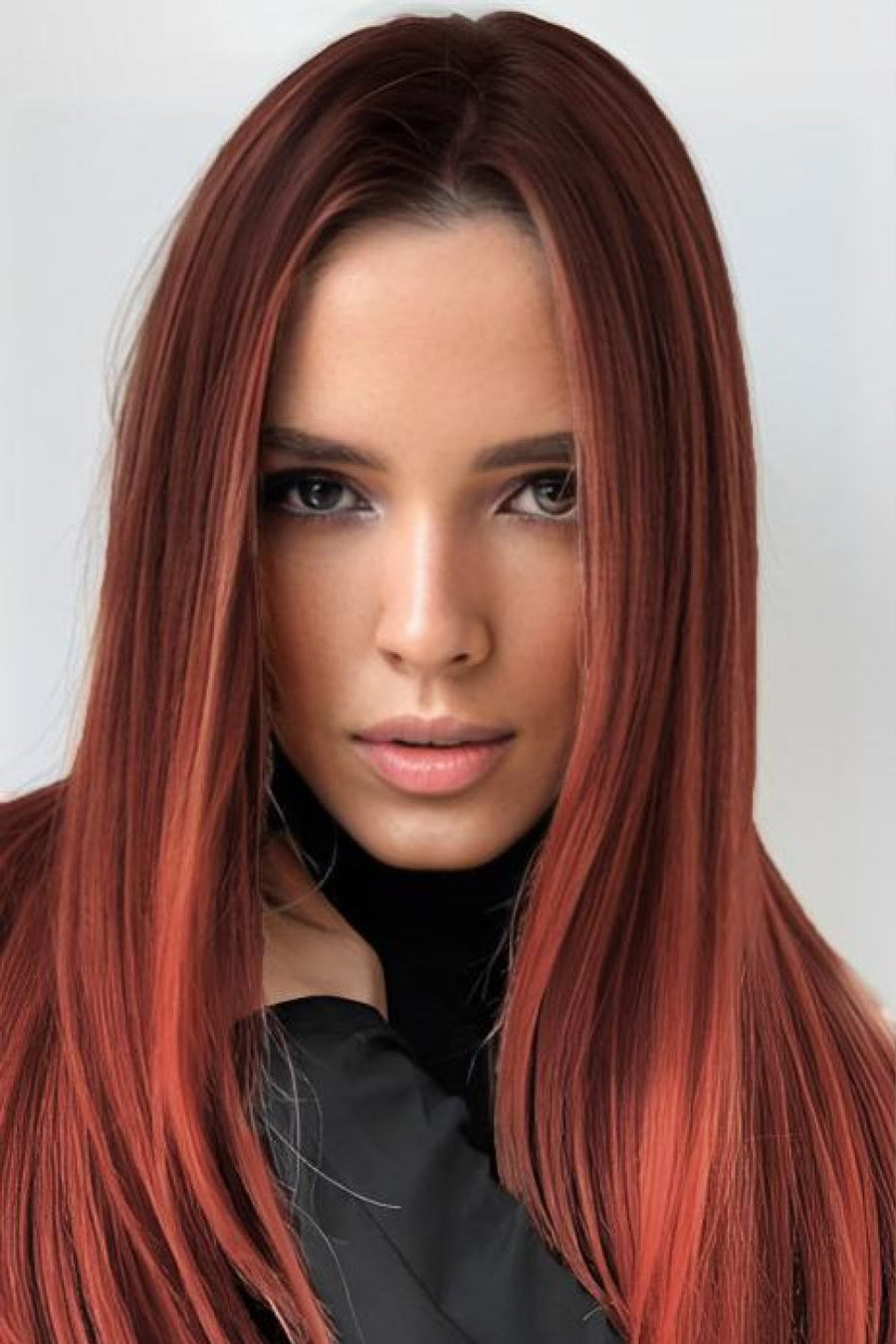 Auburn ombre center-parted wig with copper brown roots, styled straight.