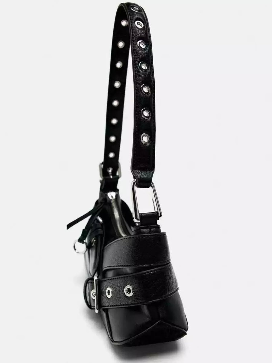 Black leather shoulder bag with buckle and grommet details