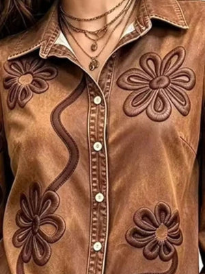 tan button-up shirt featuring button-front and floral