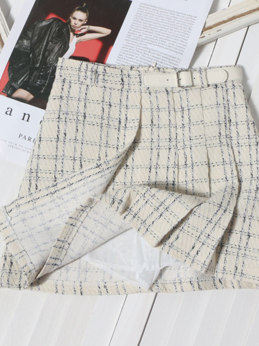 Beige plaid mini skirt with a white belt and ruched detailing
