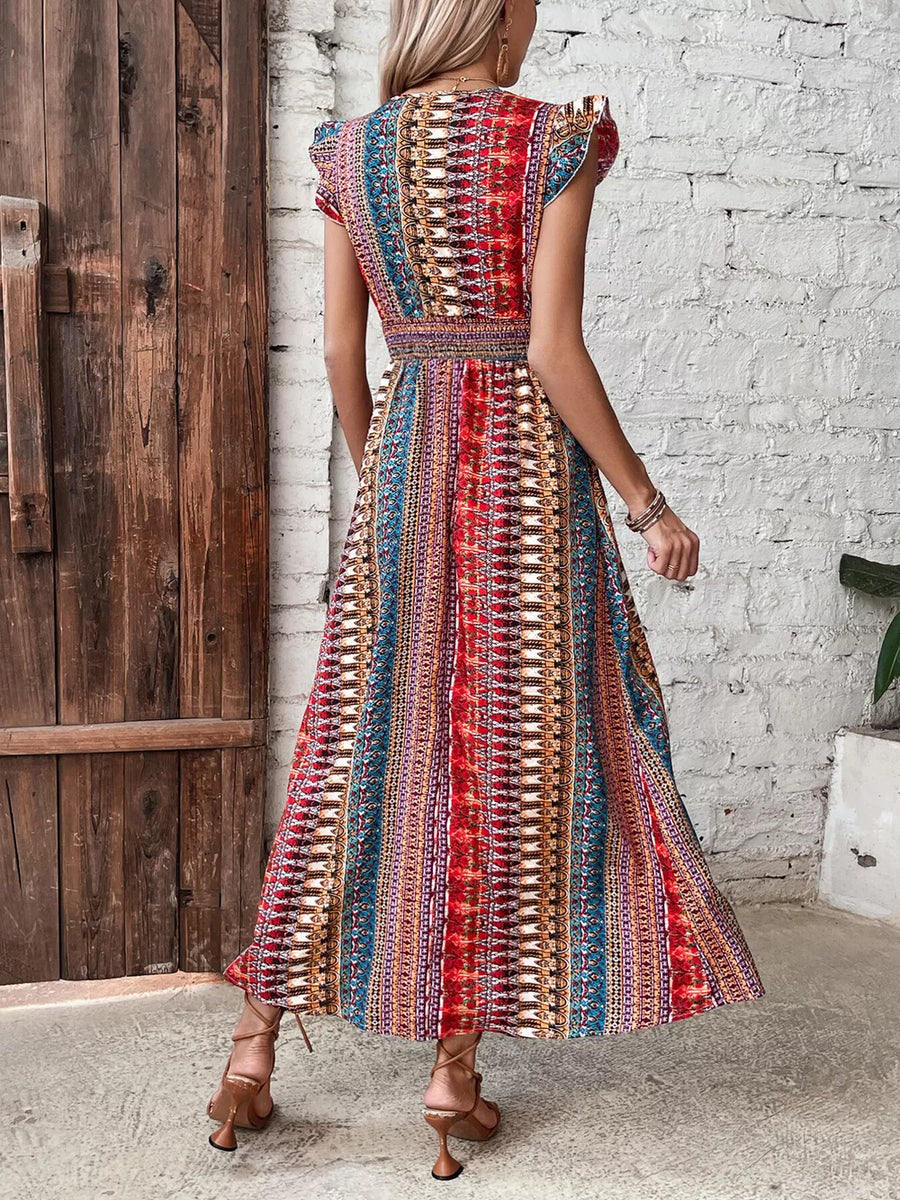 Bohemian maxi dress with ruffle sleeves and a colorful geometric print.