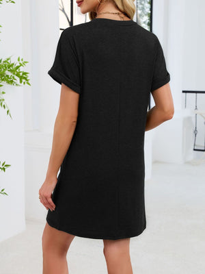 Black v-neck t-shirt dress with cuffed short sleeves and above-knee length.