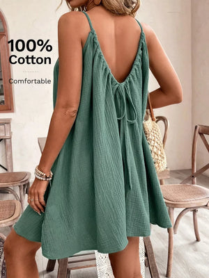 Mint green cotton gauze spaghetti strap dress with tie back detail