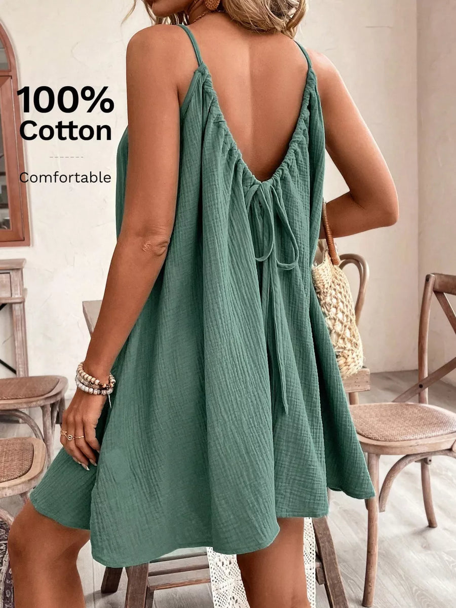 Mint green cotton gauze spaghetti strap dress with tie back detail