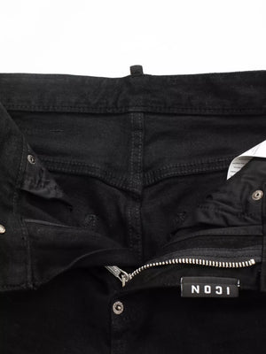 Black cotton slim fit jeans with zip fly and button closure.