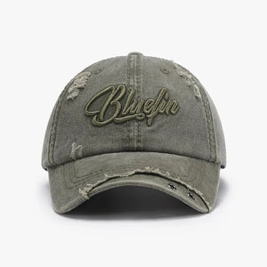 Sage cotton baseball cap with distressed details and embroidered logo