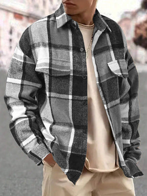 brown button-up shirt featuring buttoned and plaid