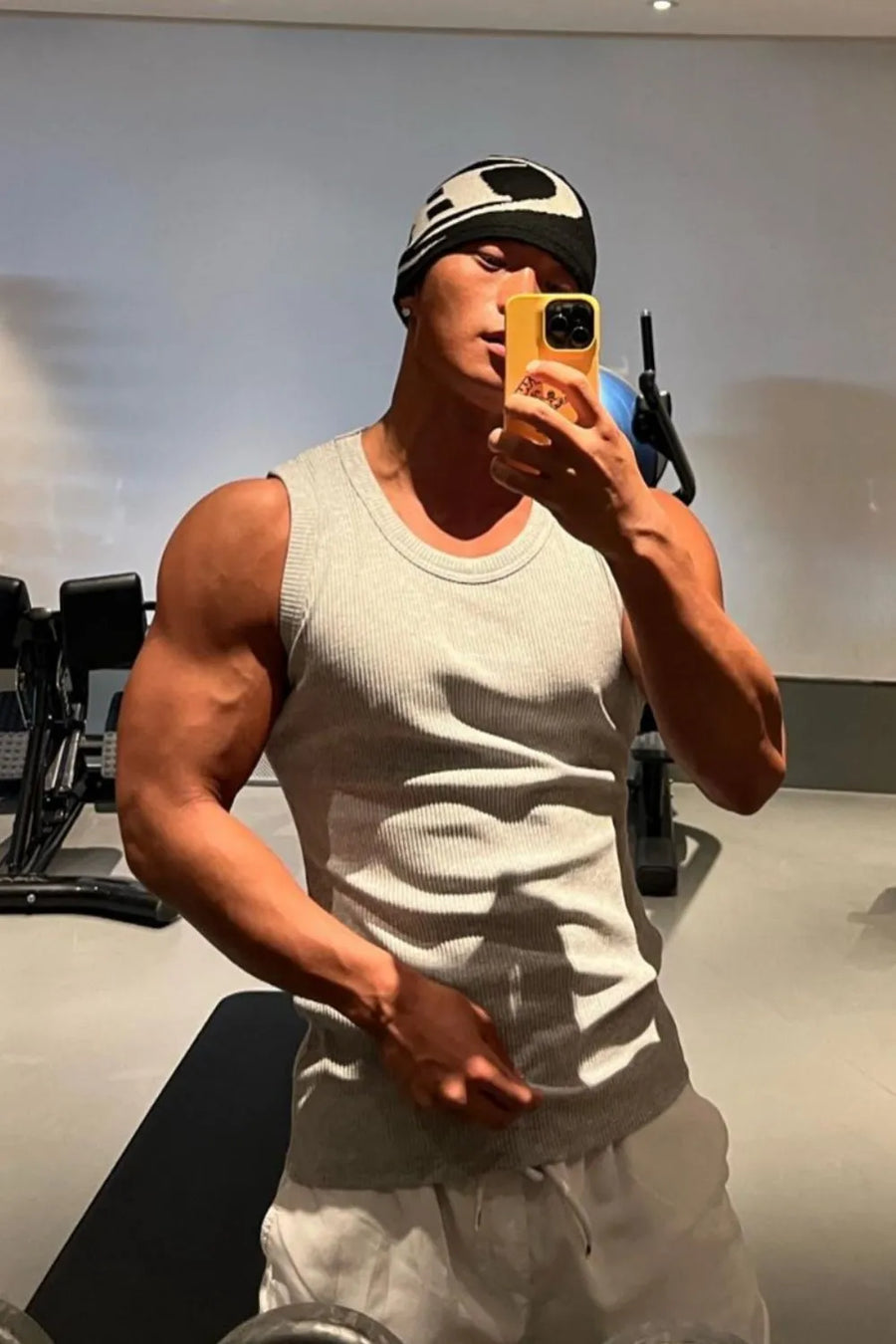 Gray ribbed cotton muscle tank top with a crew neck.