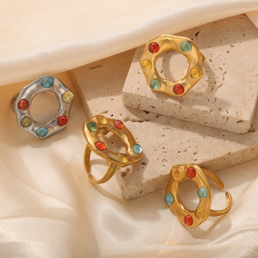 Gold and silver rings with colorful gemstones, adjustable, statement halo design
