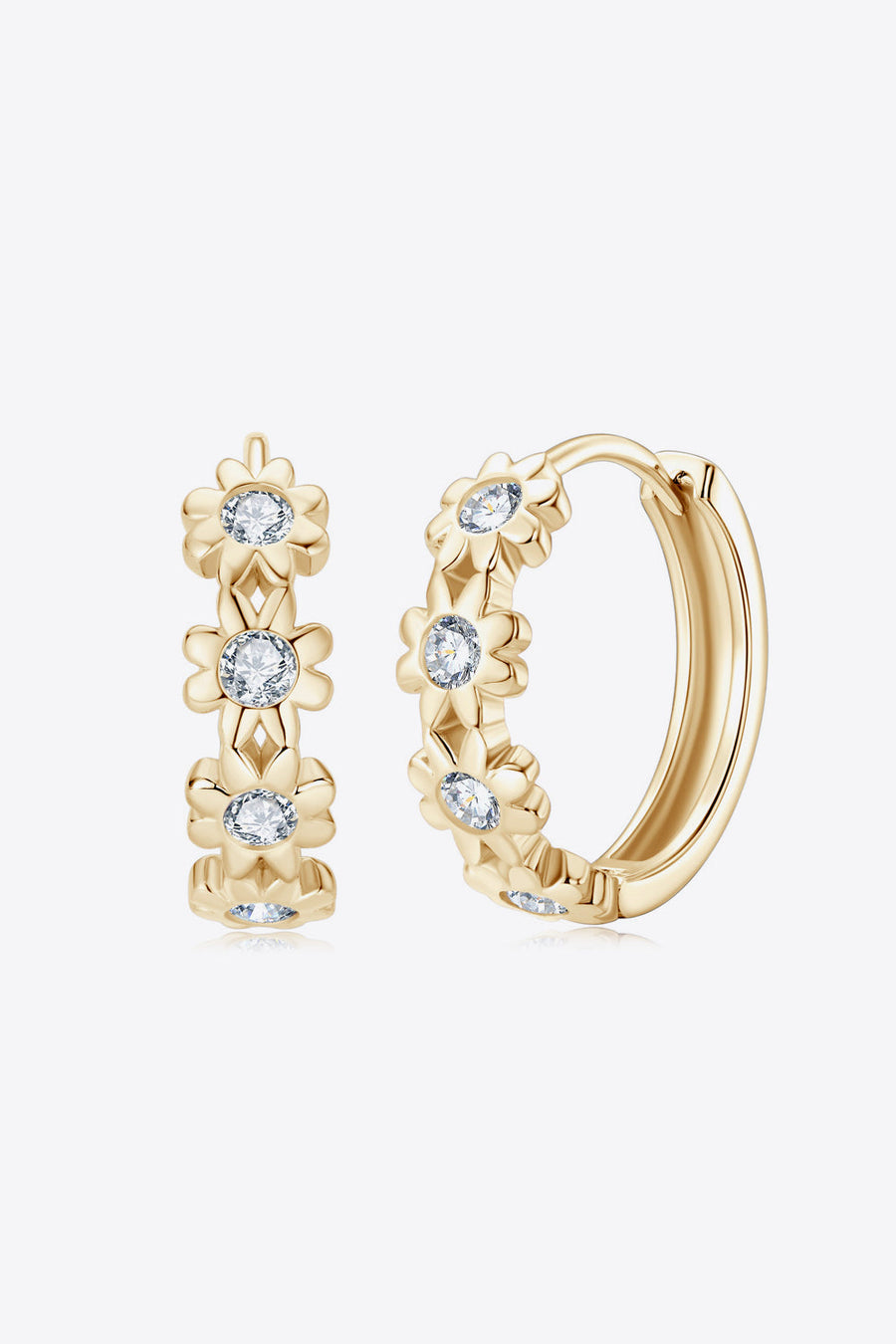 Gold huggie hoop earrings with floral embellishments and clear stones