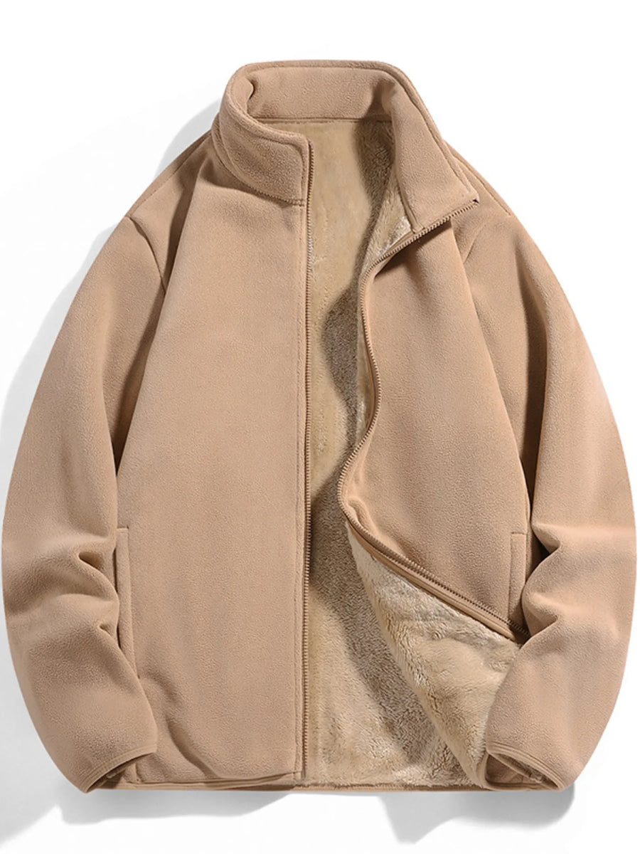 Fleece lined zip-up jacket in apricot with a stand collar and full zip closure.