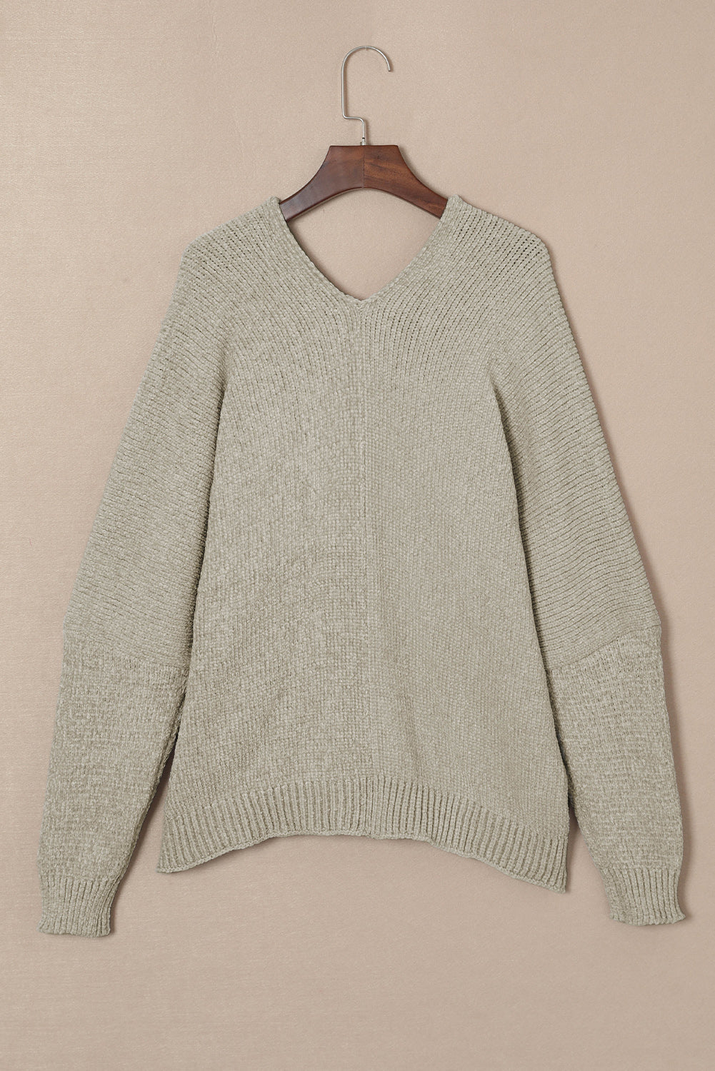 Khaki plush knit cardigan with deep V-neck and ribbed cuffs and hem.