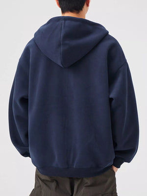 Navy blue casual zip-up hoodie with a loose fit and hood.