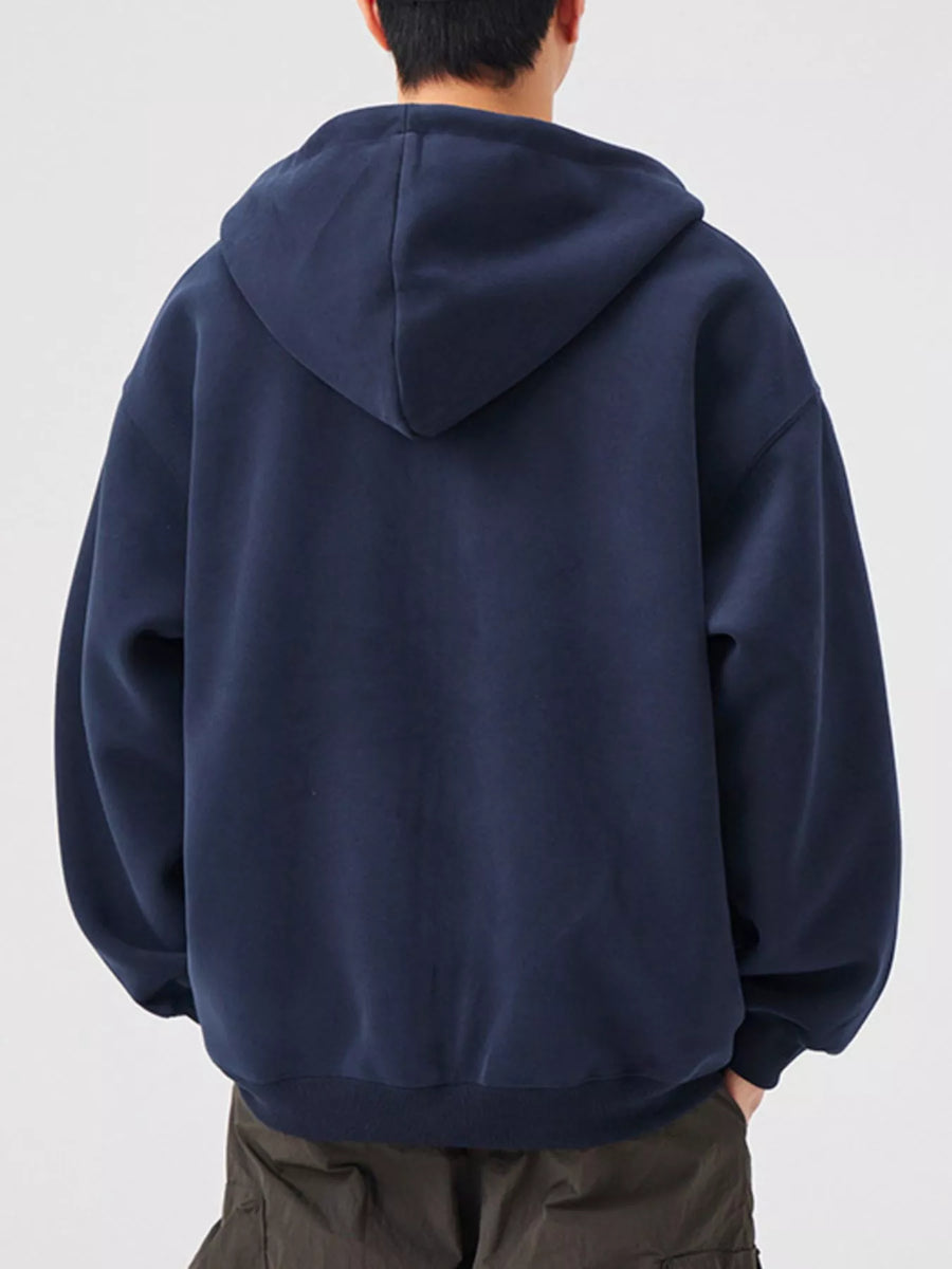 Navy blue casual zip-up hoodie with a loose fit and hood.
