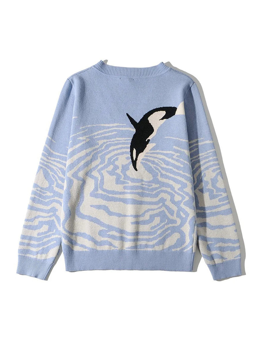Light blue acrylic blend V-neck sweater with an orca jumping through water pattern.