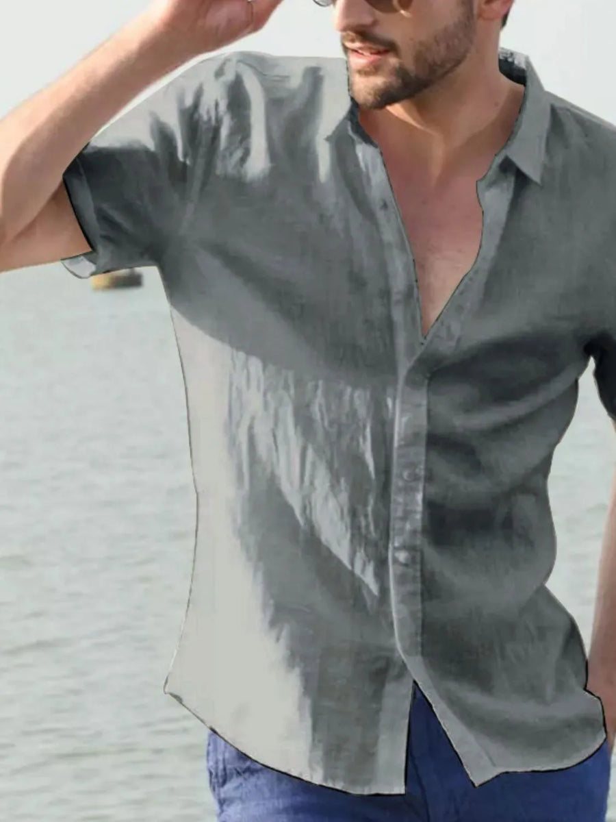 Gray linen resort shirt, short sleeve, buttoned, relaxed fit, perfect for summer.