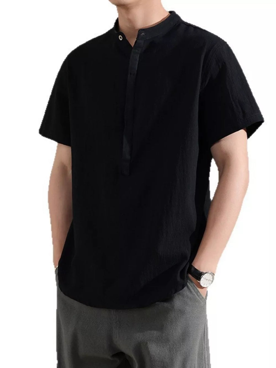 Black cotton short sleeve shirt with band collar and buttoned placket
