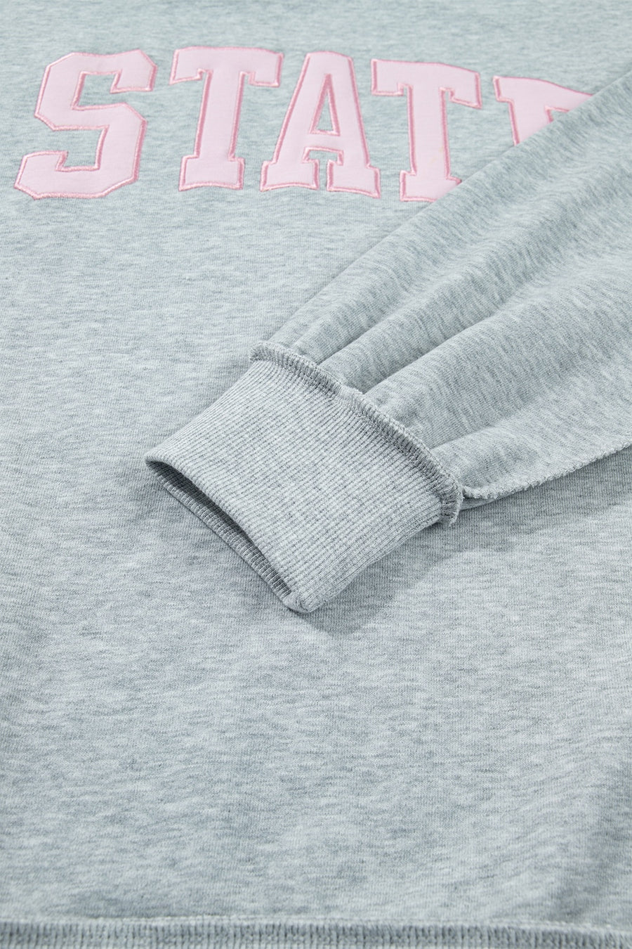 sweatshirt in light gray with oversized and hip-length
