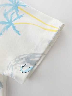 Toddler white t-shirt with blue palm trees and yellow stripes.