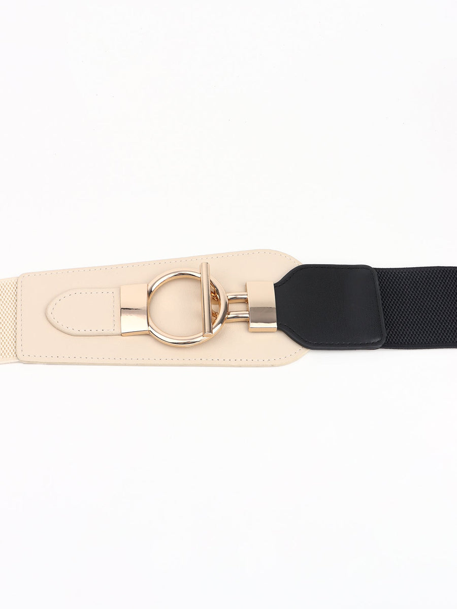 Cream and black elastic belt with gold D-ring buckle and hardware detail