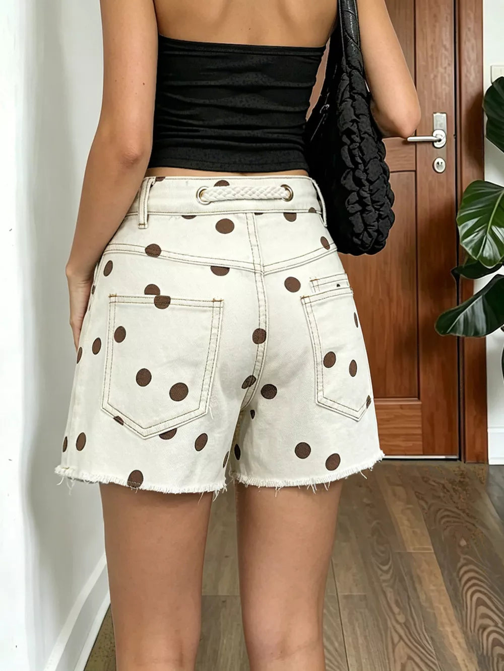 Dusty Pink denim shorts featuring raw hem and polka dot