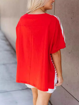 Red t-shirt with white stripes on sleeves and hem, polyester, short sleeves, crew neck.