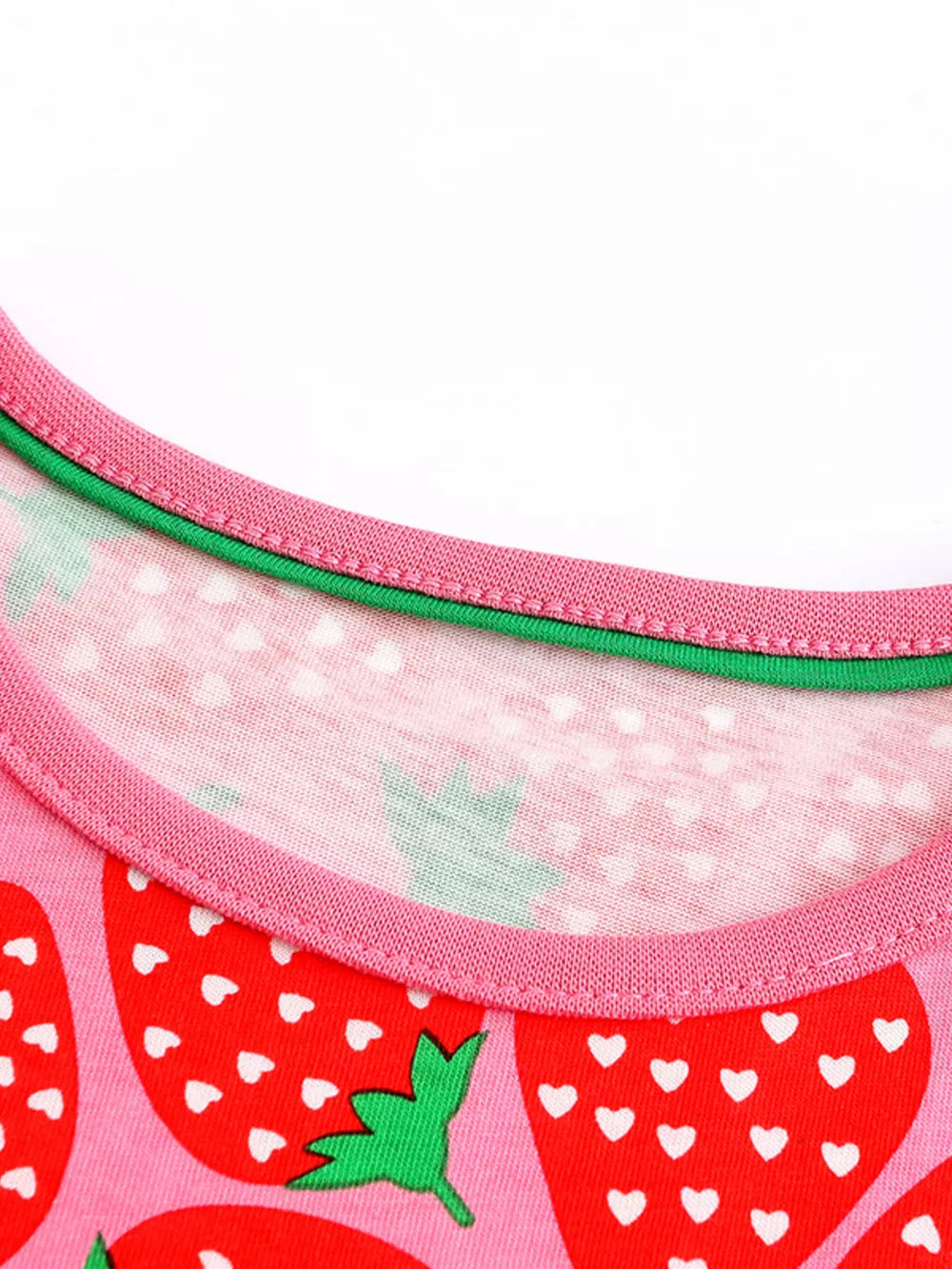 Toddler dress with strawberry print, pink cotton blend, round neckline with pink and green trim.