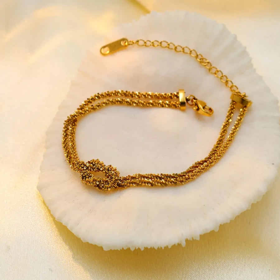 18K Gold-Plated,Stainless Steel,Silver-plated Care instructions: Avoid wearing d bracelet in Silver with chain silhouette