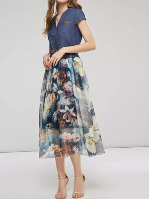 Blue denim button-down top dress with a flowing floral chiffon maxi skirt.