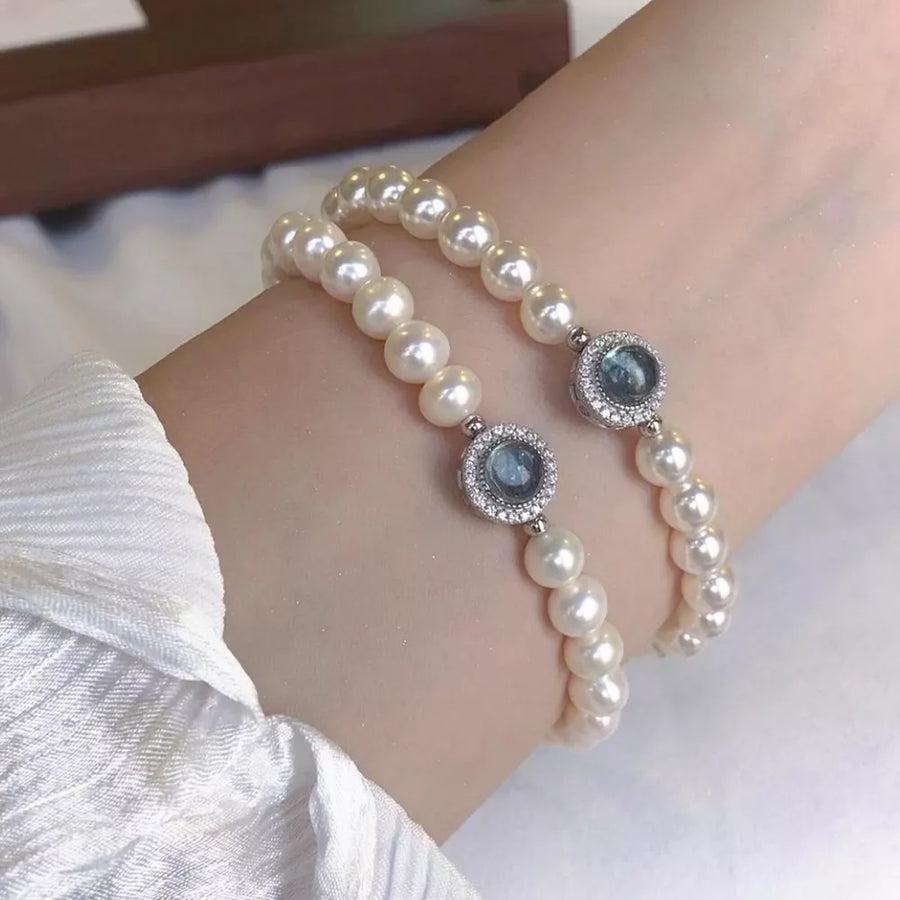 Synthetic Pearl, 925 sterling silver, Zircon Care instructions: Avoid wearing du bracelet in silver with straight silhouette