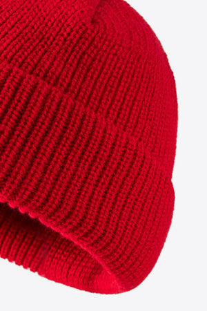 Red ribbed knit beanie with folded edge detail