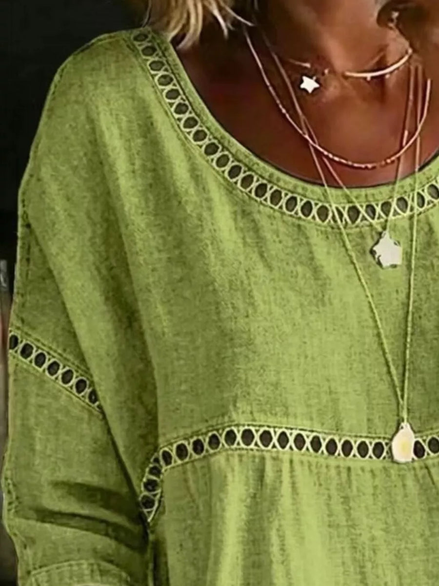Light green bohemian t-shirt with openwork floral detail at neckline and waist