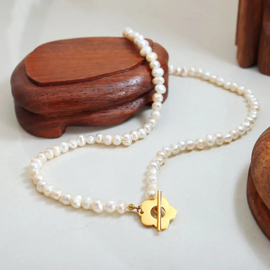 Gold floral clasp freshwater pearl necklace